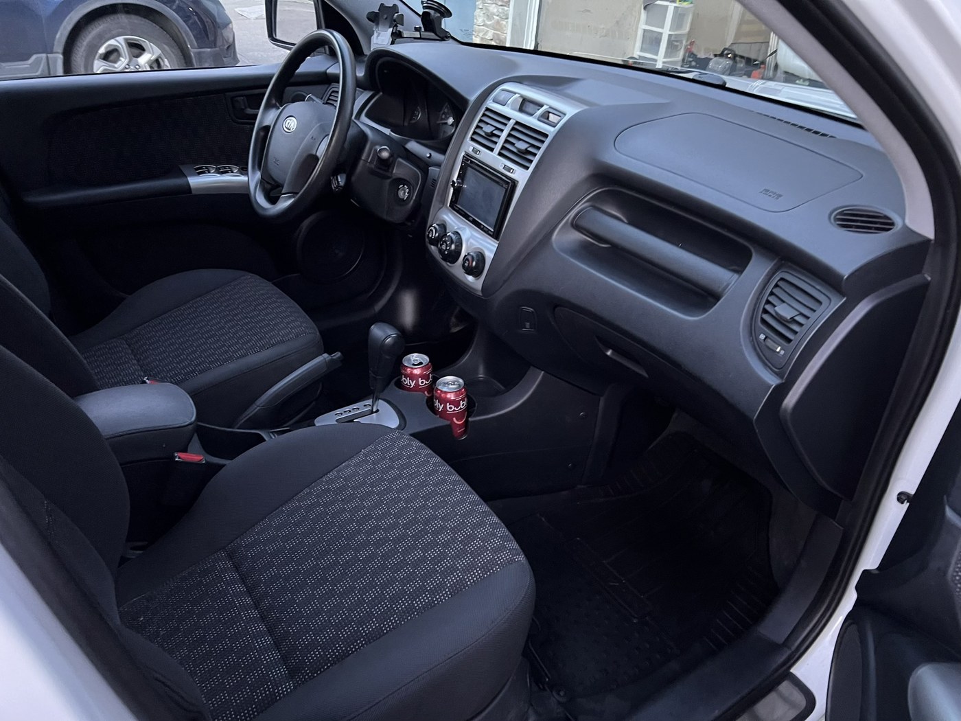 Clean front interior of a Kia
