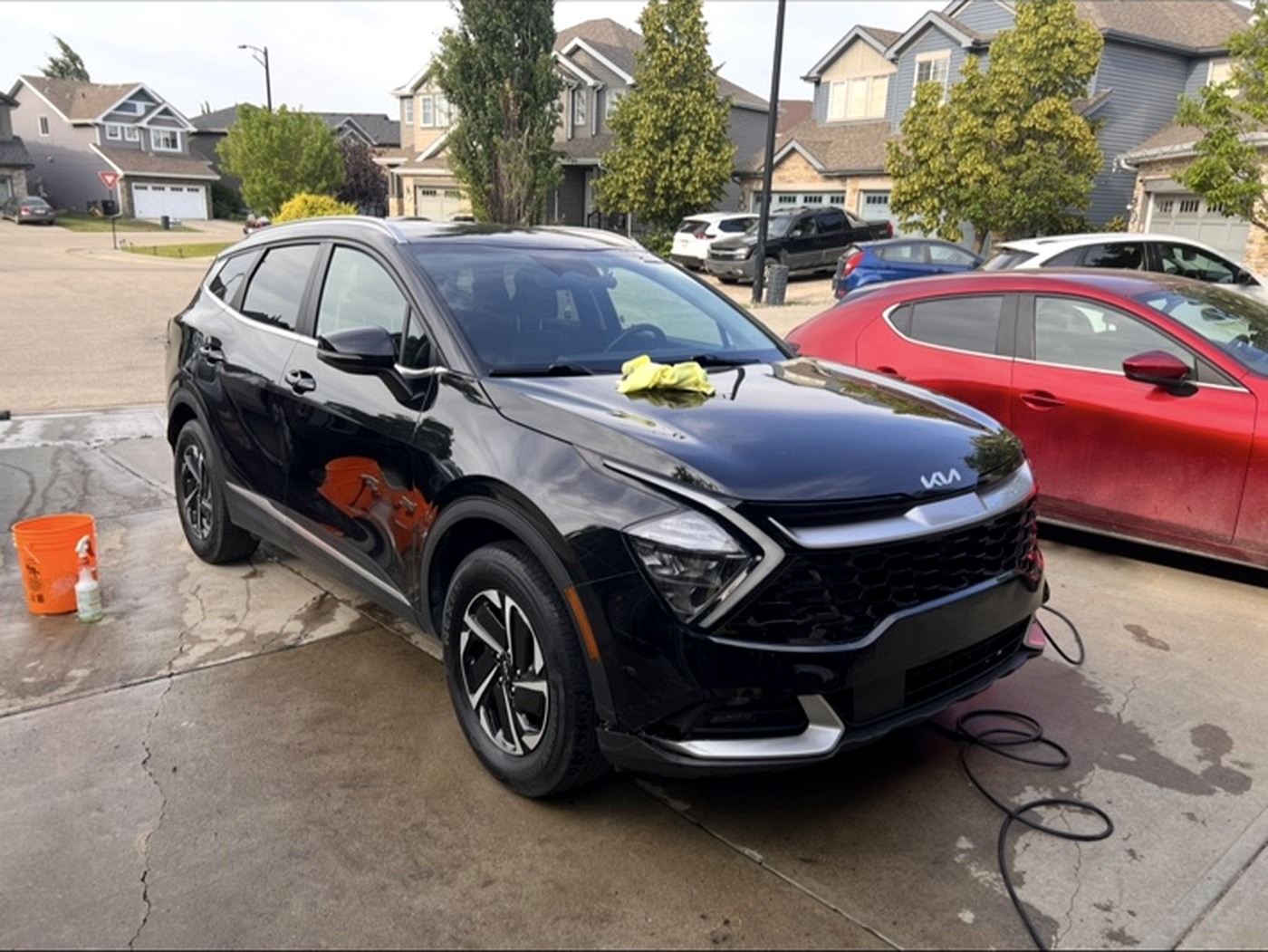 Black Kia Sportage after exterior detailing