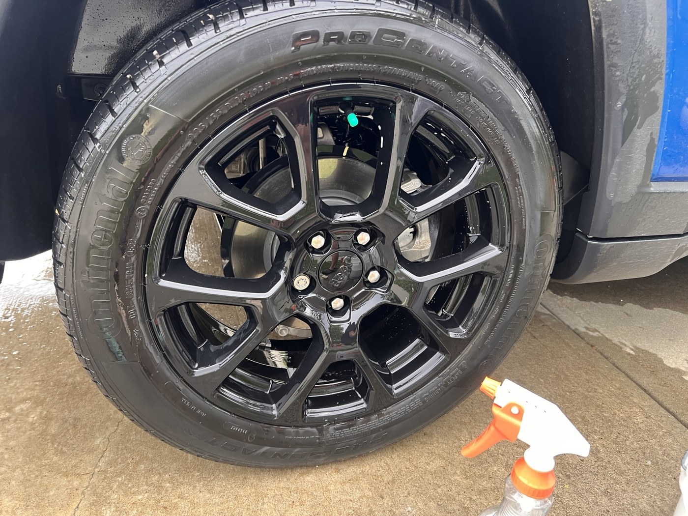 Detailed black Jeep wheel and tire